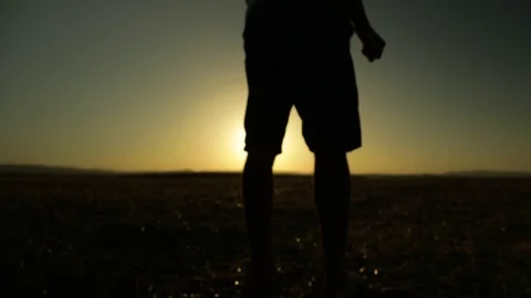 WALKING INTO THE SUNSET Stock Footage 97995613