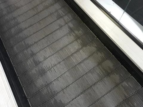 Walking Surface in a Gym With Rows of Moving Strips for Exercise Equipment Stock Photos