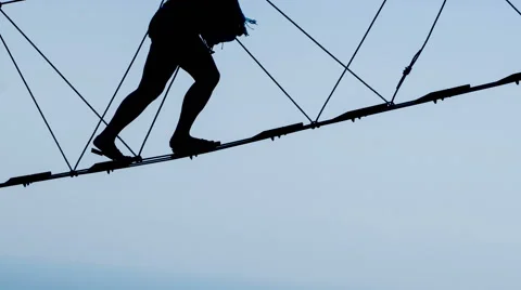 Walking a Suspension Bridge Stock Footage 53067841