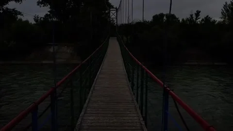 Walking on the suspension bridge Stock Footage 316941950