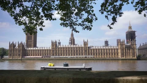 Walking the Thames path handheld Slow motion Westminster, Big Ben clock Stock Footage 172466974