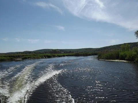 Walking on things by the river Stock Photos