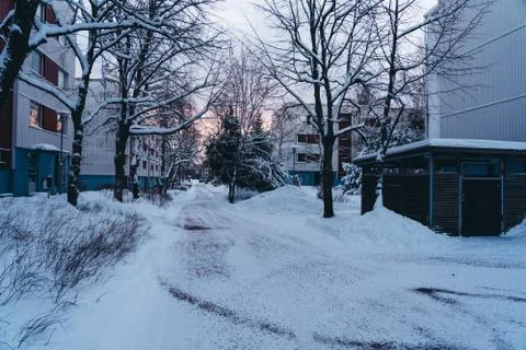 Walking though the suburbs with concrete panel houses on a winter day Foto stock
