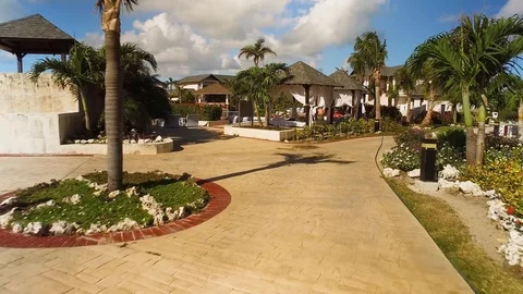 Walking though a tropical resort Stock Footage 86706801