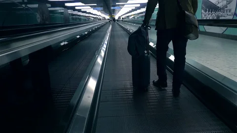 Walking through airport to catch a plane Stock Footage 119073304