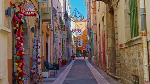 Walking through the ancient streets of the historic center of the city of Hyeres Stock Footage 302172689