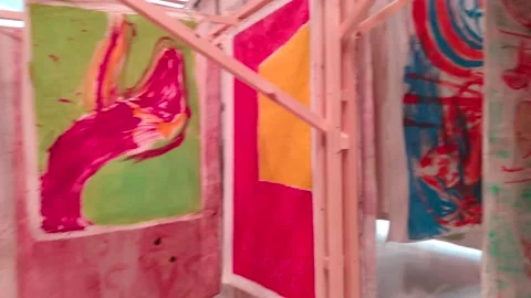 Walking Through an Art Gallery with Tons of Canvases, 4k Stock Footage 157660446