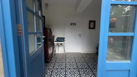 Walking Through Blue Door into Charming Vintage Interior in Sapanca Turkey Stock Footage 342279580