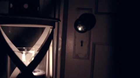 Walking through a building with a lantern. Stock Footage 68357390