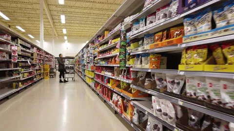 Walking Through Candy Bar Sugar Sweets Section Of Grocery Store With Female Stockbeeldmateriaal 154775240