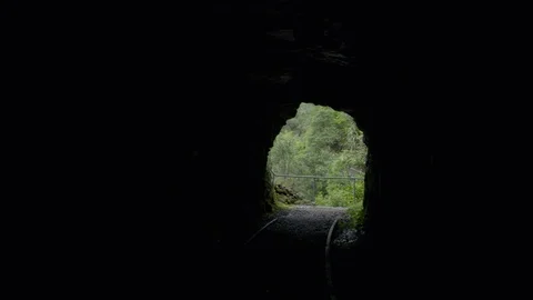 Walking Through Cave Stock Footage 86511347