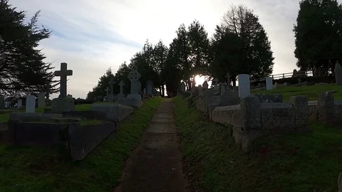 Walking through cemetery: Point of view (POV) with AUDIO Stock Footage 121619459