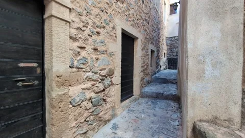 Walking through the charming streets of Monemvasia, Greece, under clear skies an Video stock 301191083