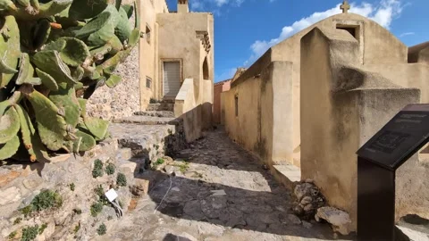 Walking through the charming streets of Monemvasia, Greece, under clear skies an Video stock 301191267