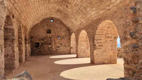 Walking through the charming streets of Monemvasia, Greece, under clear skies an Video stock 301191377