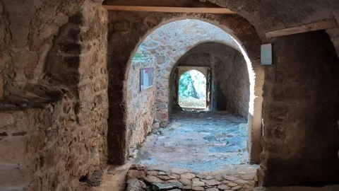Walking through the charming streets of Monemvasia, Greece, under clear skies an Video stock 301191412