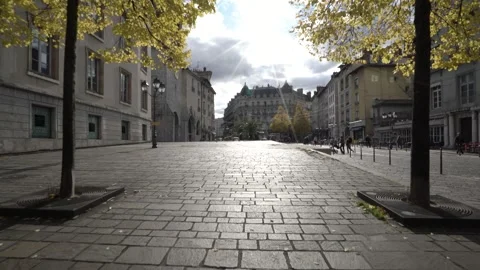Walking through city square with cobblestone in french grenoble in fall Stock Footage 262062709