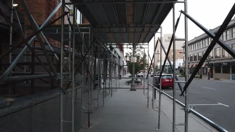Walking through construction scaffolding. Stock Footage