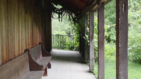 Walking through the corridor of the ancient house Stock Footage 252543300