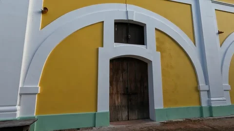 Walking through the couryard of castillo san felipe del morro (colorful colonial Stock Footage 277468787