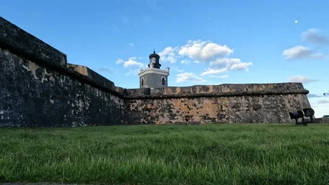 Walking through the couryard of castillo san felipe del morro (colorful colonial Stock Footage 277469249