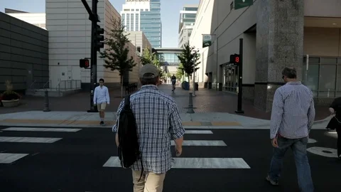 Walking Through Crosswalk 스톡 동영상 100034064