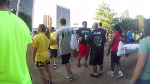 Walking through Crowd at 5K race Stock Footage 56456449