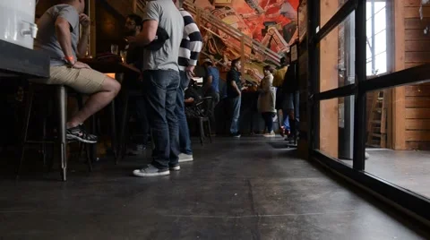 Walking through crowd in bar Stock Footage 68151835