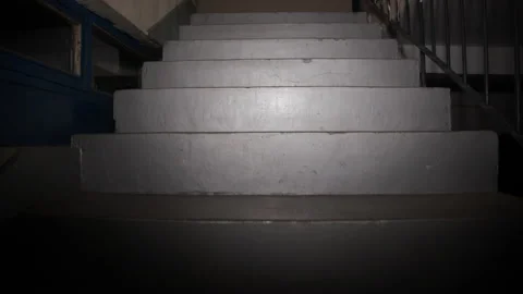 Walking through dark hallway by night 4K video Stock Footage 162689688