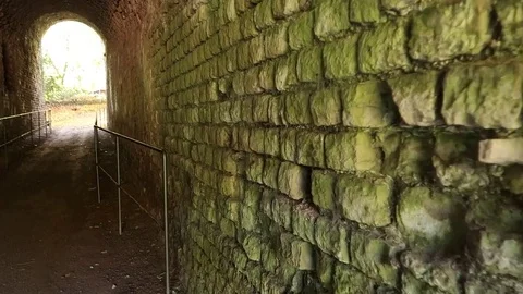 Walking through dark tunnel Stock Footage 81182950