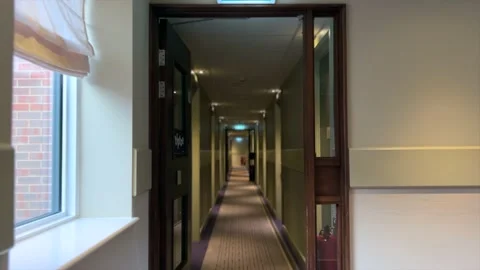 Walking through a deserted hotel corridor Stock Footage 226953155