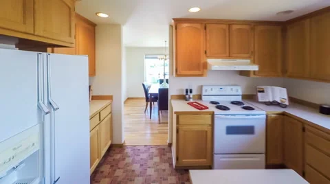 Walking Through Domestic Kitchen to Dining Room Stock Footage 64228192