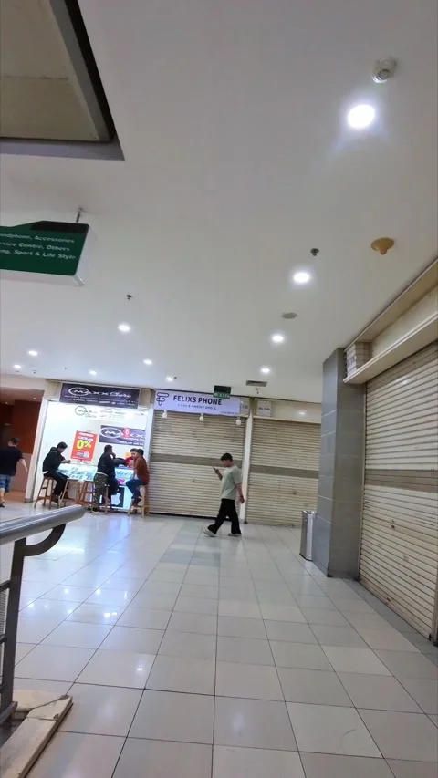 Walking through an electronics store at BEC Mall Bandung Stock Footage 333426912