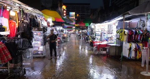 Walking through empty passage of Petaling Market at rainy evening Stock Footage 319637813