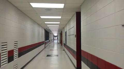Walking through an empty school that is vacant due to COVID-19, Coronavirus Video stock 136834207