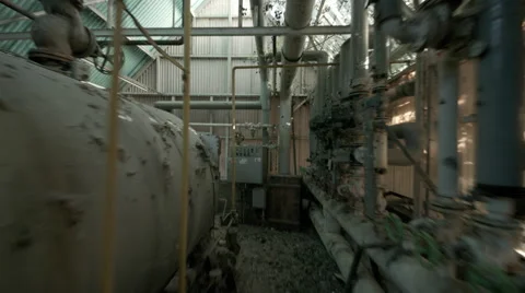 Walking through factory Vídeos de archivo 62651568