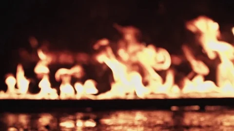 Walking through the fire in a army boots Stock Footage 77069232