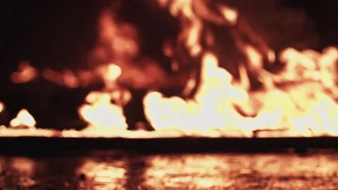 Walking through the fire in a army boots Video stock 77069250