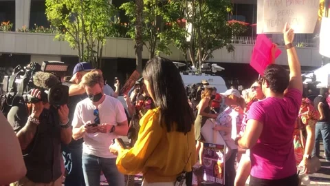 Walking through Free Britney crowd before Britney Spears  conservatorship ending Stock Footage 185665015