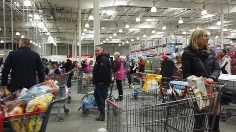 Walking Through Full Lines Of Shoppers At Costco With Stuffed Carts Stocking Stock Footage 126619170