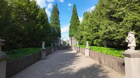 Walking Through Garden Corridor with Statues, Iron Gates, Allerton Park UIUC Stock Footage 274427839