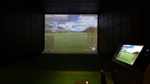Walking Through the Golf Simulator Room decorated with the cosy armchairs Stock Footage