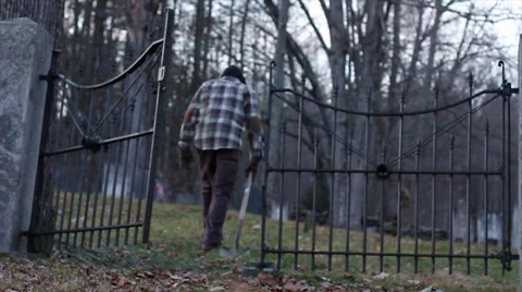 Walking Through Graveyard Gate (no effects) Stock Footage 33399022