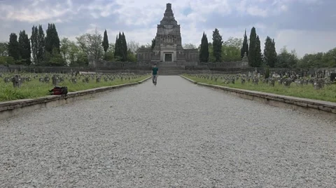 Walking through a graveyard with a huge mausoleum Stock Footage 54918098