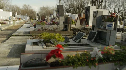 Walking through graveyard POV Stock Footage 23730528