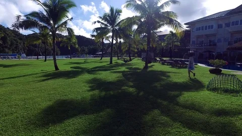 Walking through the grounds of Cove Hotel in Palau Stock Footage 93247457