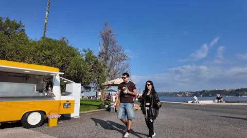 Walking Through Historic Belem Lisbon Portugal With Tourists Restaurants And Sho Stock Footage 344807298
