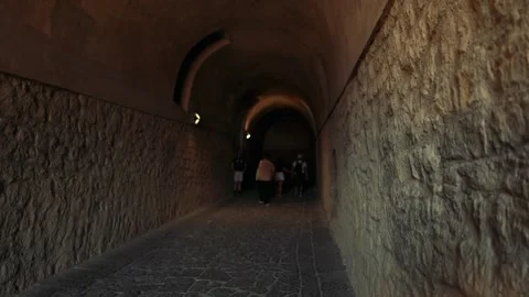 Walking Through Historic Tunnel in Naples Stock Footage 309376682