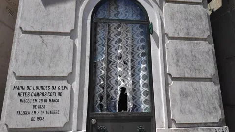 Walking through historical cemetery with old crypts and angel statues Stock Footage 310859416