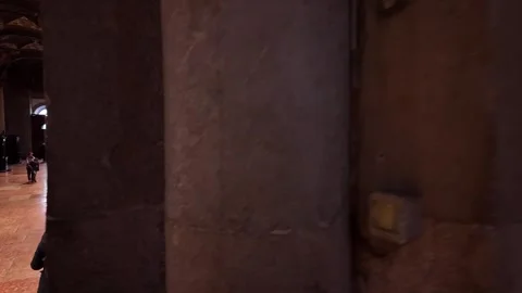 Walking through interior of Parma Cathedral, Italy, with tourists taking Stockbeeldmateriaal 296729073